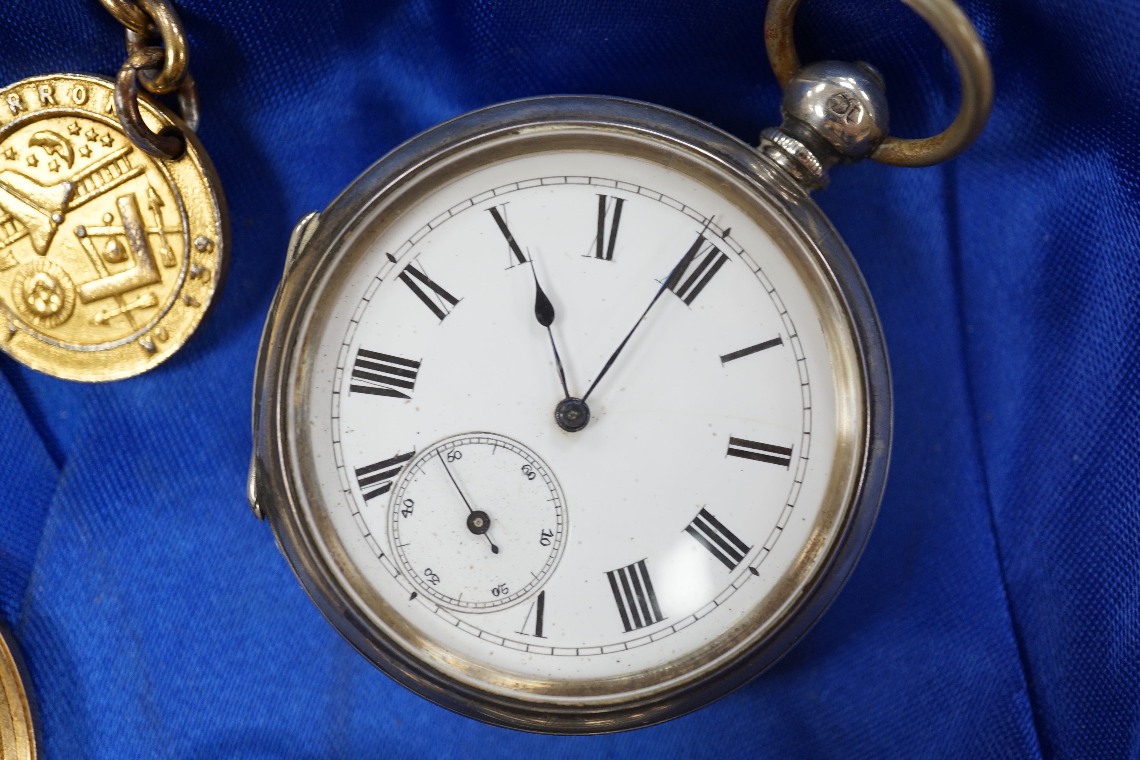 Two silver albert chains, including graduated link and silver gilt(worn), largest 40cm, together with eight assorted pocket or fob watches including silver, white metal and gold plated.